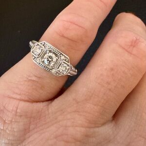 Elegant Moissanite Fire(R) Dew Round Plantine(R). Sz 6.
